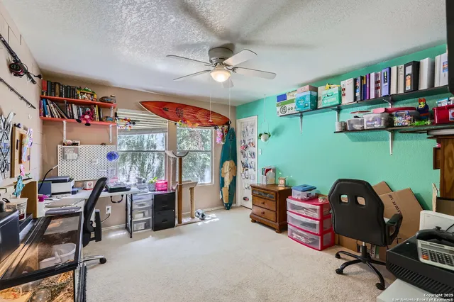 a workspace with a bookshelf