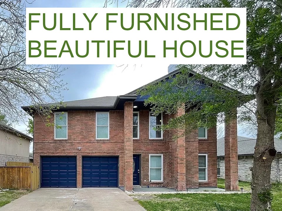 2502 Tracy Cove Leander, TX 78641 - Photo 1 of 34 a sign that is on a brick wall