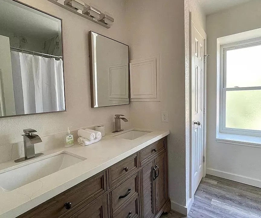 2502 Tracy Cove Leander, TX 78641 - Photo 15 of 34 a bathroom with a sink and a mirror