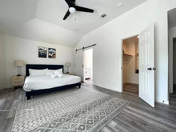 2502 Tracy Cove Leander, TX 78641 - Photo 17 of 34 a bedroom with a bed and a rug