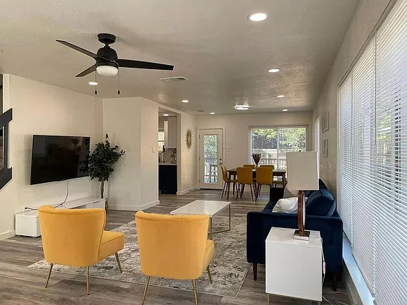 2502 Tracy Cove Leander, TX 78641 - Photo 2 of 34 a living room with furniture and a flat screen tv