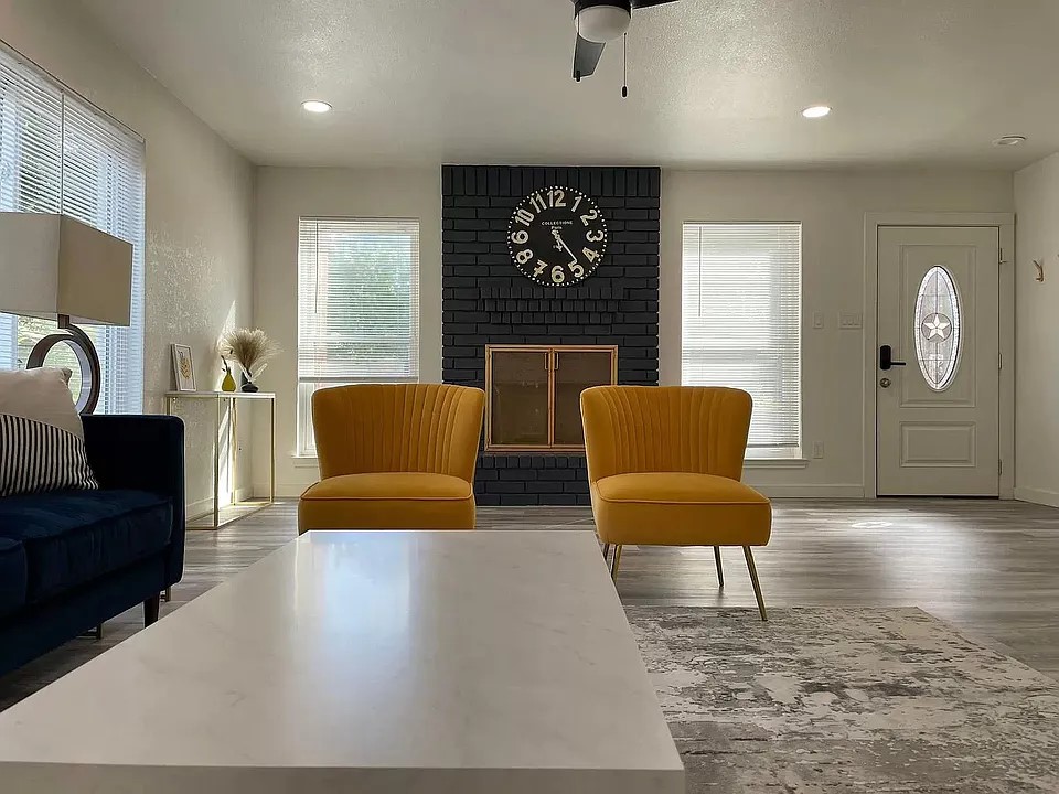 2502 Tracy Cove Leander, TX 78641 - Photo 3 of 34 a living room with furniture and a large window