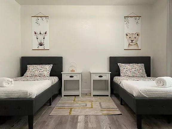 2502 Tracy Cove Leander, TX 78641 - Photo 31 of 34 a bed room with a bed and painting on the wall