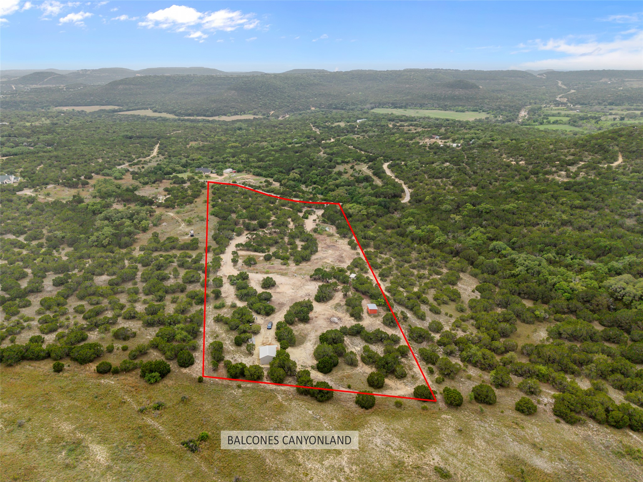 182 Quail Creek Road Marble Falls, TX 78654 - Photo 1 of 20 Approximate boundary lines. Standing at the top of the property, looking down. Backs to Balcones Canyonland Wildlife Refuge