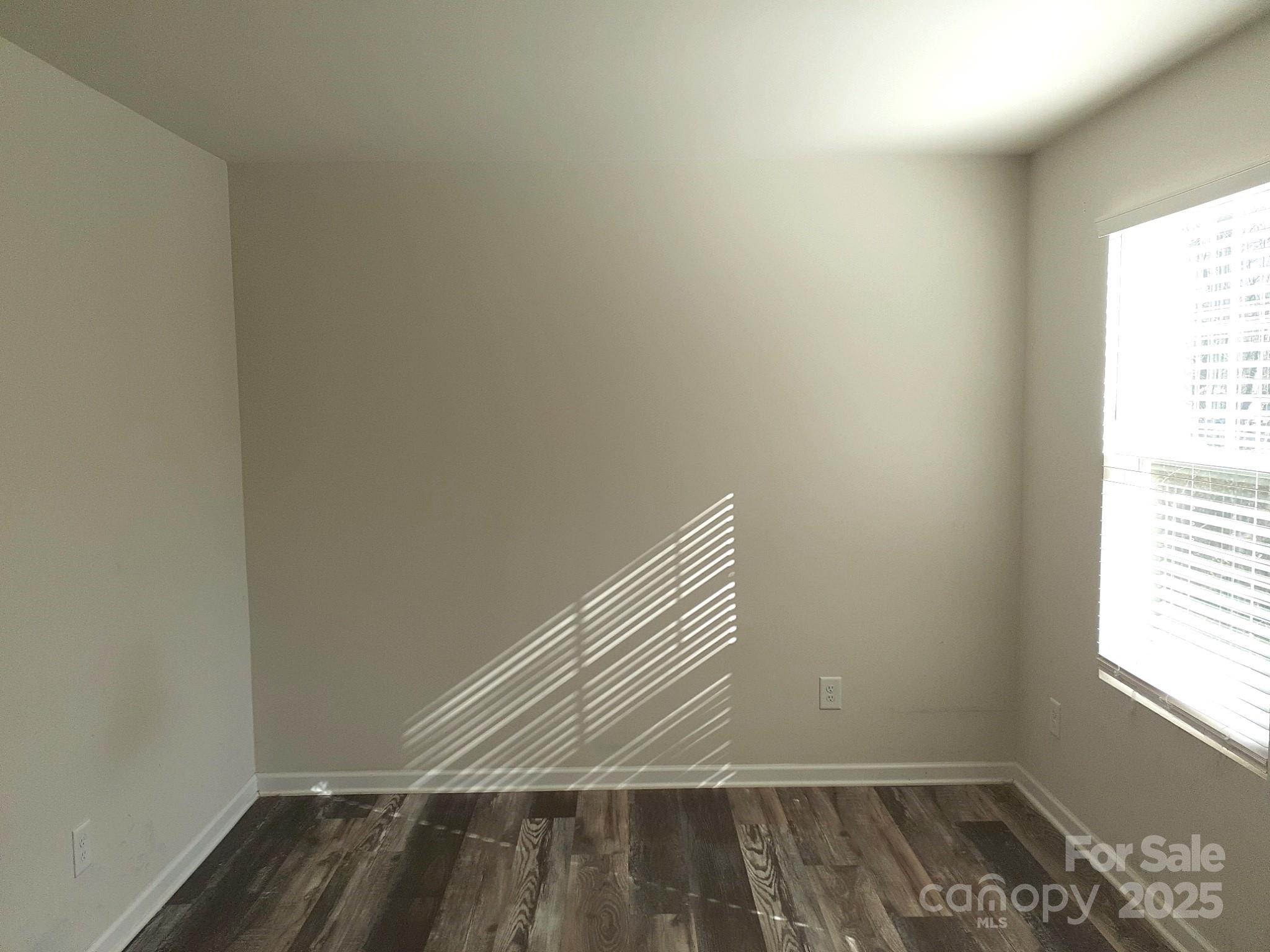 3944 Wade E Morgan Road Charlotte, NC 28269 - Photo 11 of 20 a view of wooden floor