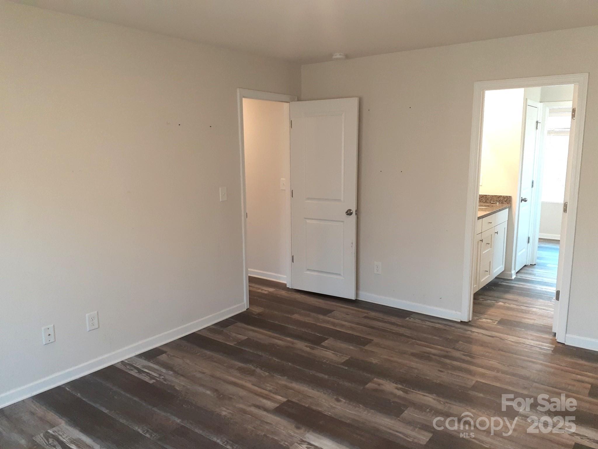 3944 Wade E Morgan Road Charlotte, NC 28269 - Photo 14 of 20 a view of a room with wooden floor