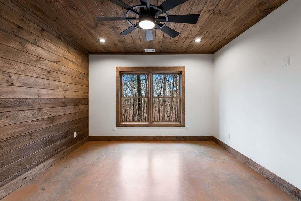 2393 Ada Street Blue Ridge, GA 30513 - Photo 37 of 56 a view of an empty room with a window