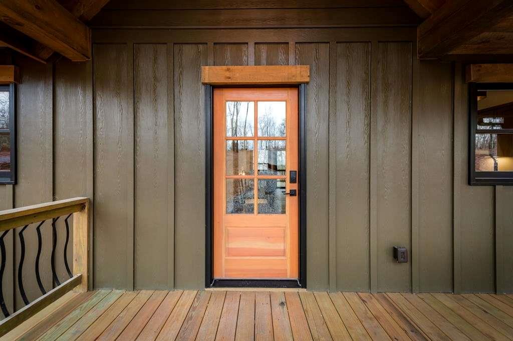 2393 Ada Street Blue Ridge, GA 30513 - Photo 44 of 56 a view of a hallway with wooden floor and a bathroom