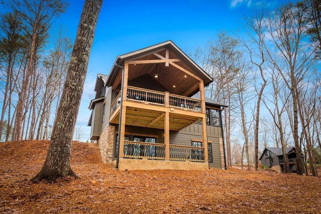 2393 Ada Street Blue Ridge, GA 30513 - Photo 47 of 56 a front view of a house with a yard