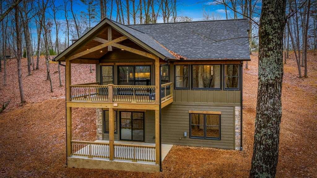 2393 Ada Street Blue Ridge, GA 30513 - Photo 50 of 56 a front view of a house with a yard