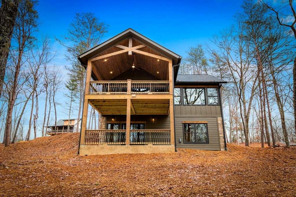 2393 Ada Street Blue Ridge, GA 30513 - Photo 51 of 56 a front view of a house with a yard