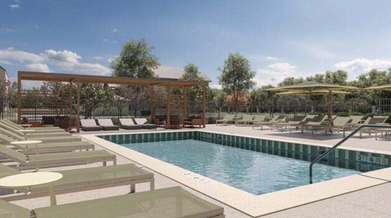 3591 Oxenfree Boulevard, Unit 3537 Frisco, TX 75035 - Photo 13 of 17 a view of swimming pool with outdoor seating and plants