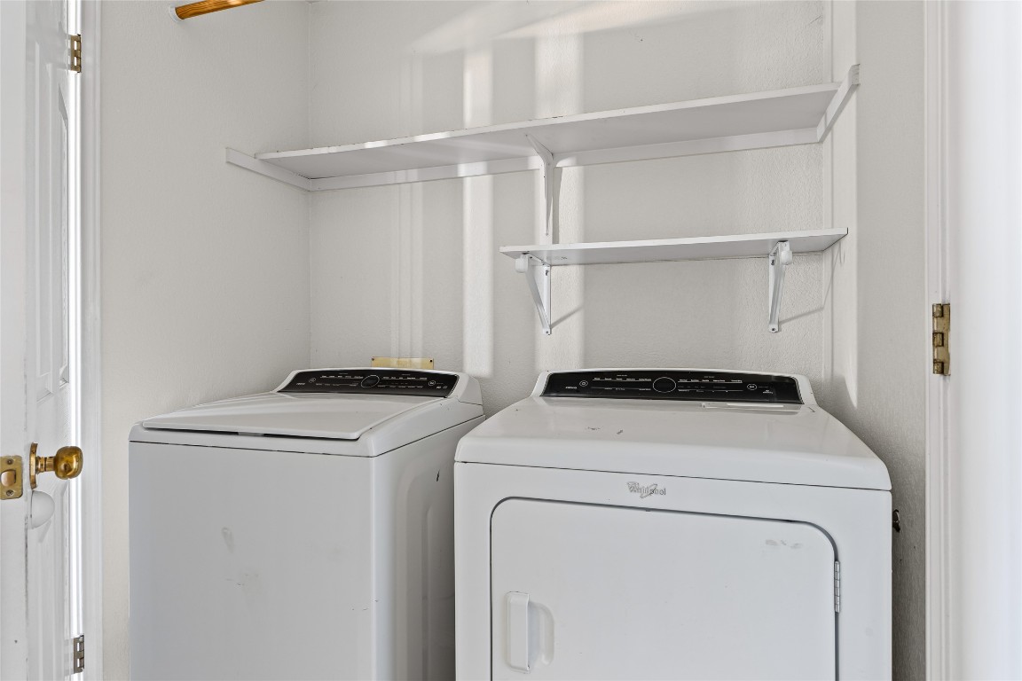 1321 Bunratty Circle Pflugerville, TX 78660 - Photo 18 of 31 Laundry area with washing machine and clothes dryer