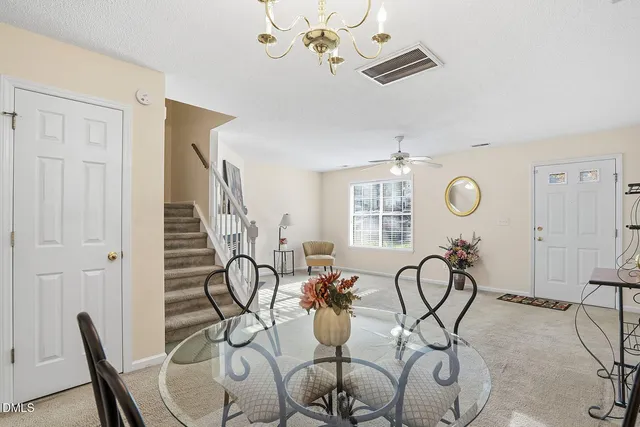 a view of a livingroom and dining room