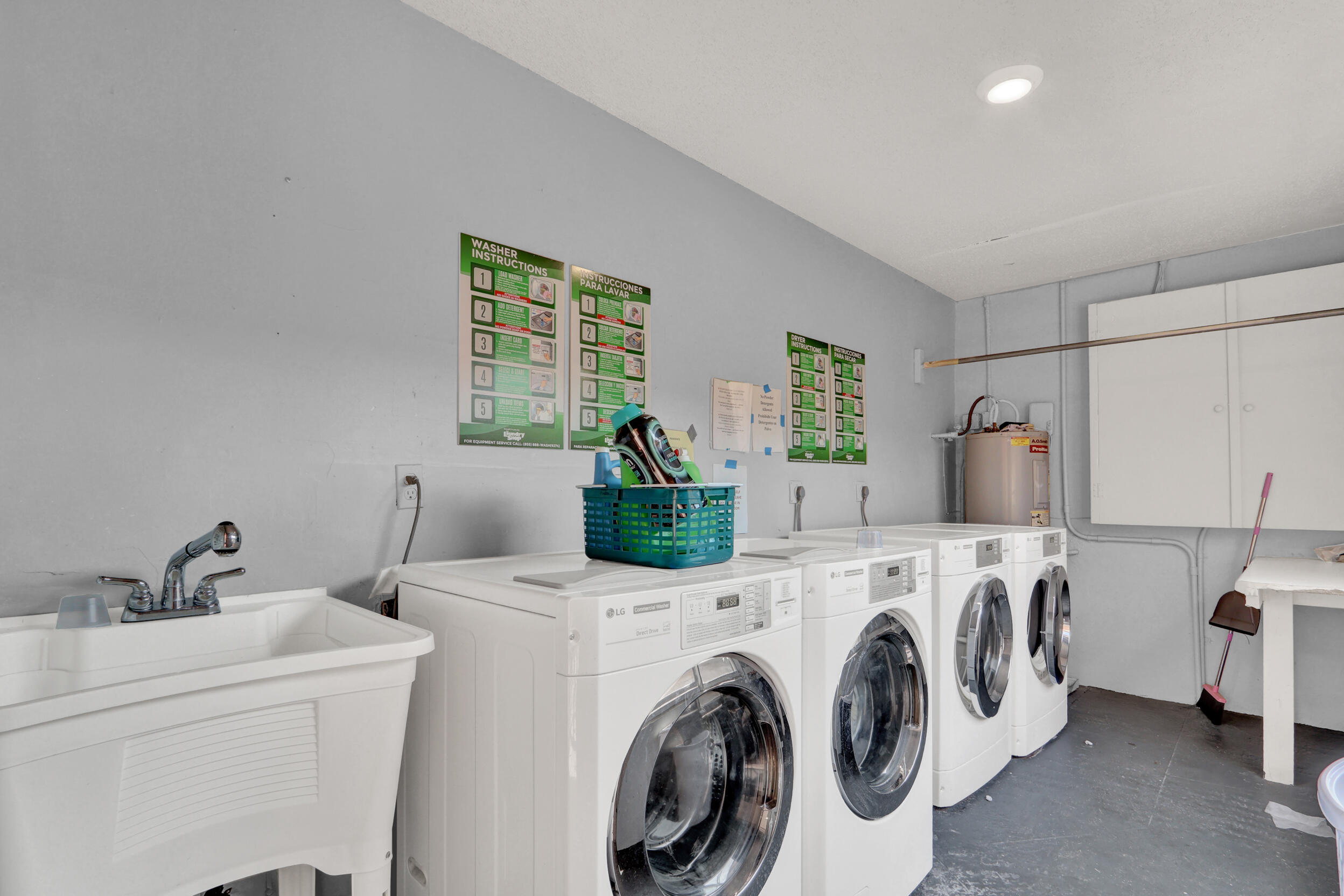 502 Davis Road, Unit 12 Palm Springs, FL 33461 - Photo 23 of 23 a utility room with dryer and washer