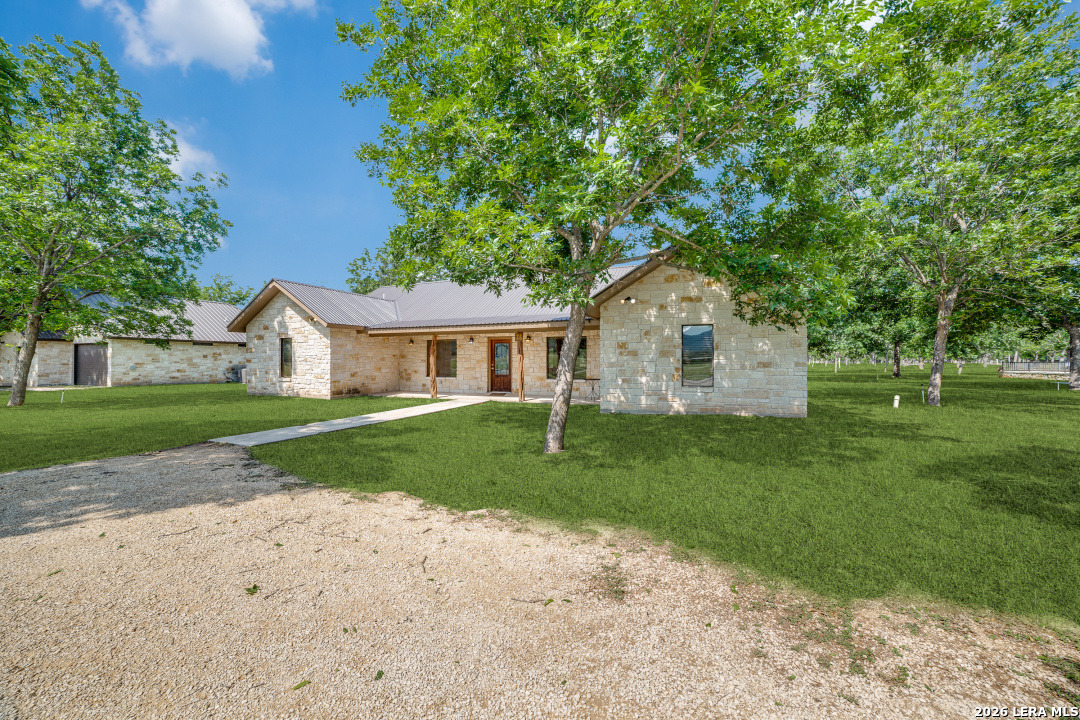 170 Johhny Seibert Lane Rio Frio, TX 78879 - Photo 2 of 50 a front view of a house with a yard