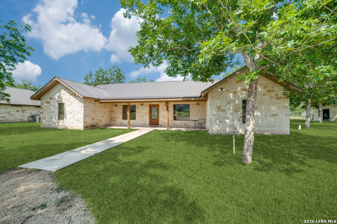170 Johhny Seibert Lane Rio Frio, TX 78879 - Photo 3 of 50 a front view of a house with a yard