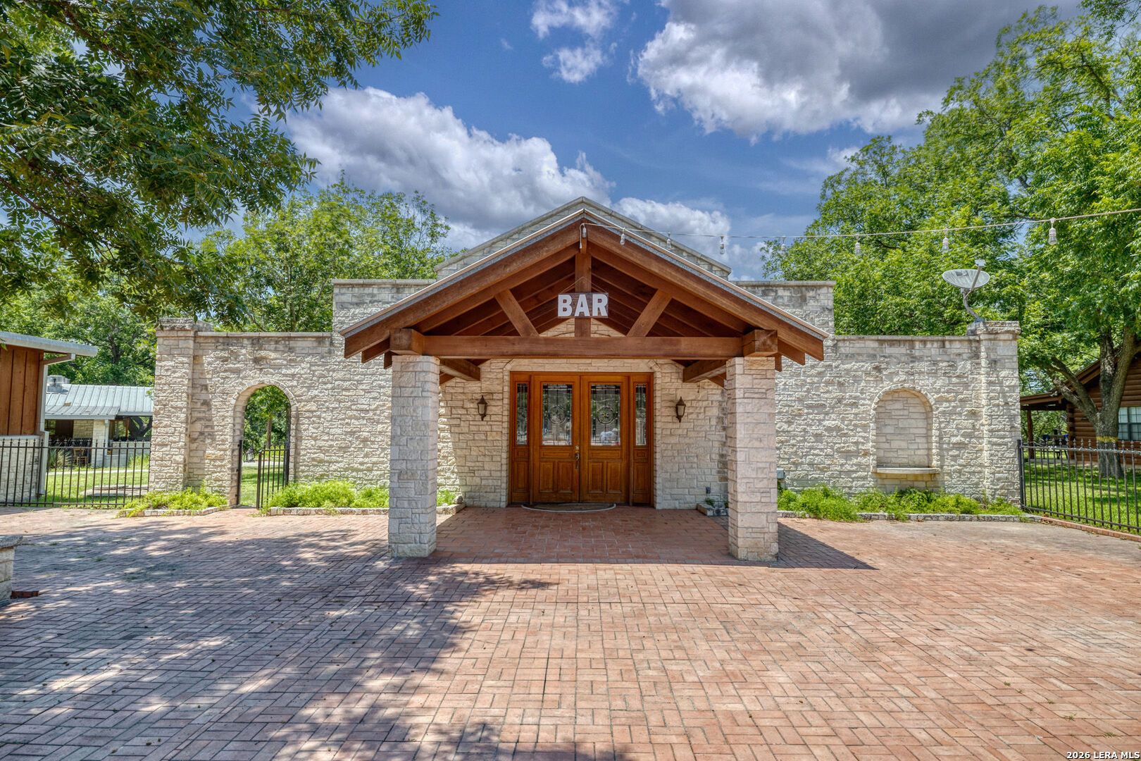 170 Johhny Seibert Lane Rio Frio, TX 78879 - Photo 40 of 50 a front view of a house with a yard and garage