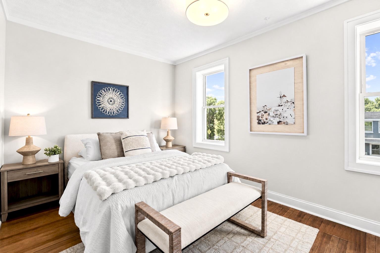 1627 Montello Avenue Northeast Washington, DC 20002 - Photo 8 of 15 a bedroom with a bed and a window