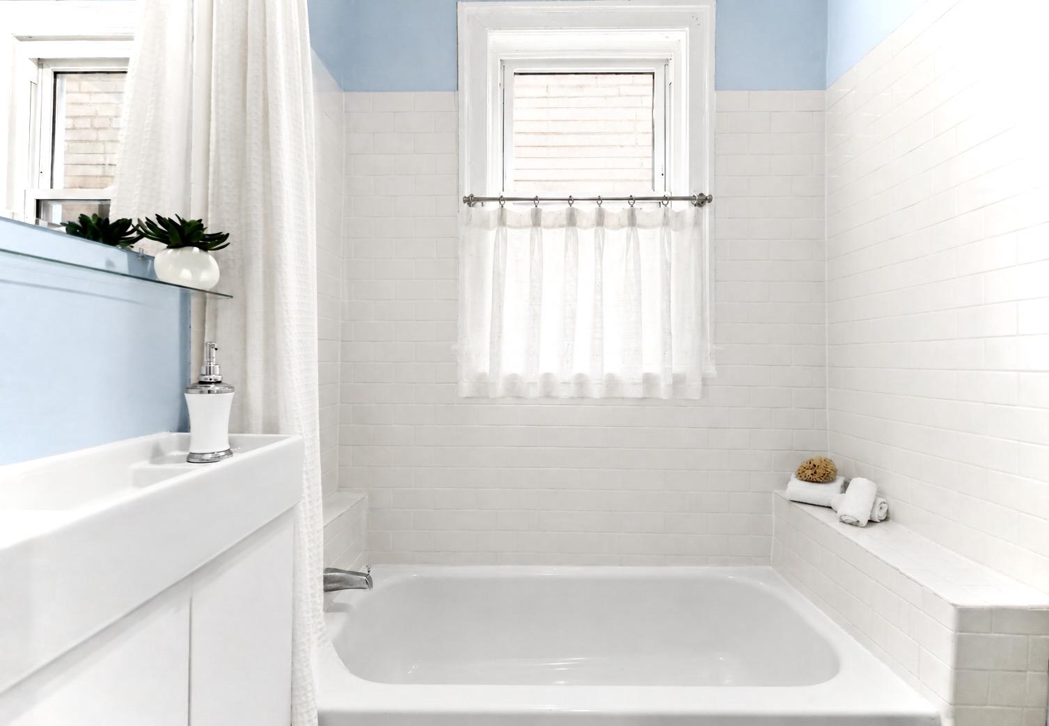 1627 Montello Avenue Northeast Washington, DC 20002 - Photo 9 of 15 a bath tub sitting next to a white sink