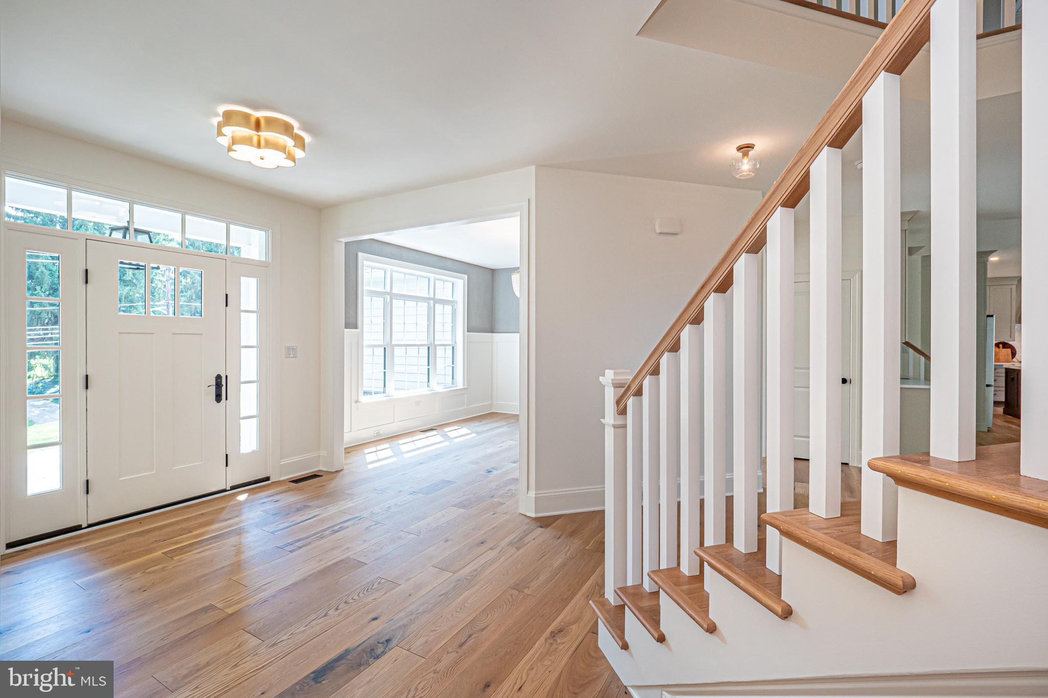 5 Timber Mill Lane, Unit BISCOTTO Landenberg, PA 19350 - Photo 5 of 70 a view of entryway with wooden floor and stairs