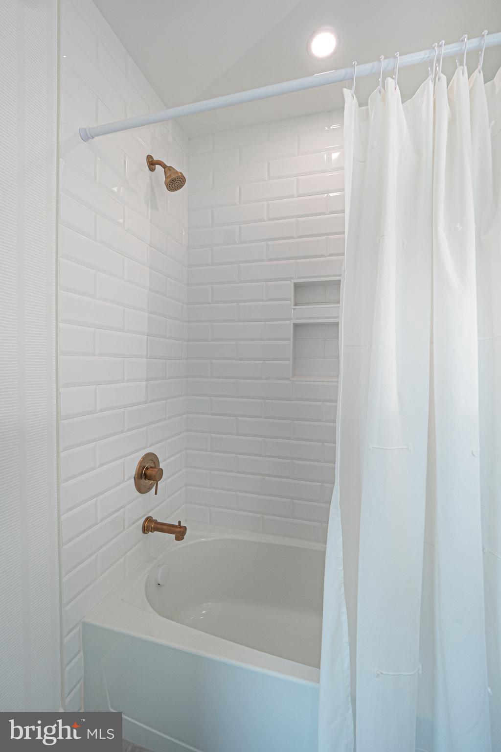 5 Timber Mill Lane, Unit BISCOTTO Landenberg, PA 19350 - Photo 69 of 70 a bathroom with a bathtub