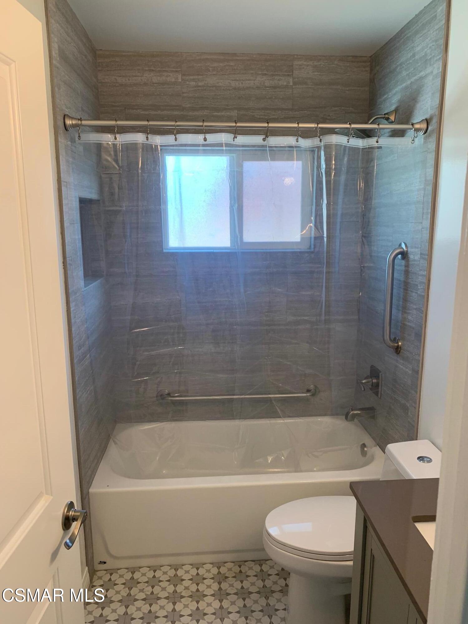 4139 Cochran Street Simi Valley, CA 93063 - Photo 13 of 21 a bathroom with a granite countertop bathtub shower sink vanity and toilet
