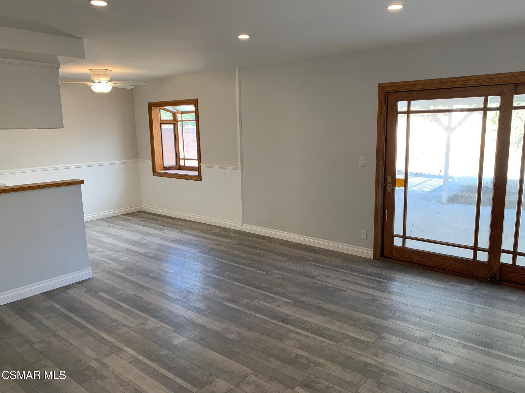 4139 Cochran Street Simi Valley, CA 93063 - Photo 6 of 21 an empty room with wooden floor and windows