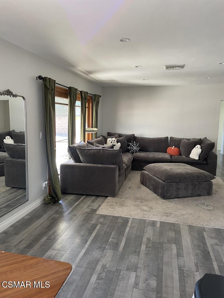 4139 Cochran Street Simi Valley, CA 93063 - Photo 8 of 21 a living room with furniture and a window