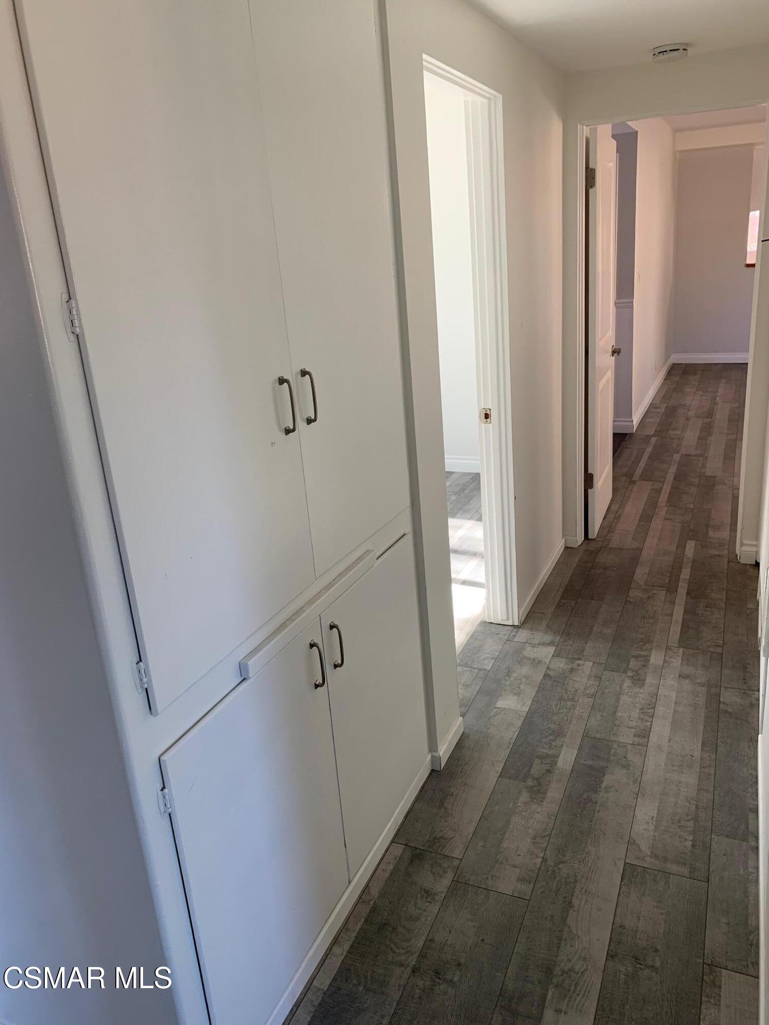 4139 Cochran Street Simi Valley, CA 93063 - Photo 9 of 21 a view of a hallway with white walls