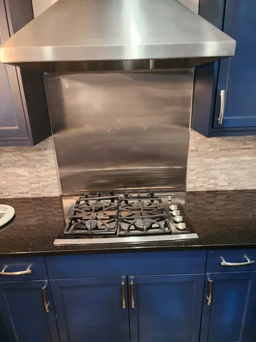 a close view of kitchen countertops with stove