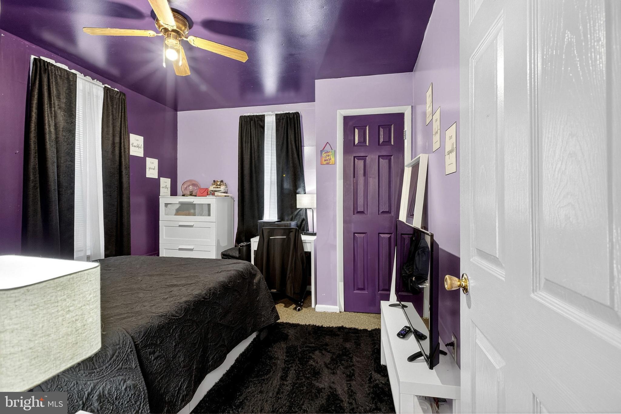 4824 Regent Street Philadelphia, PA 19143 - Photo 12 of 22 Vibrant purple retreat with cozy charm.
