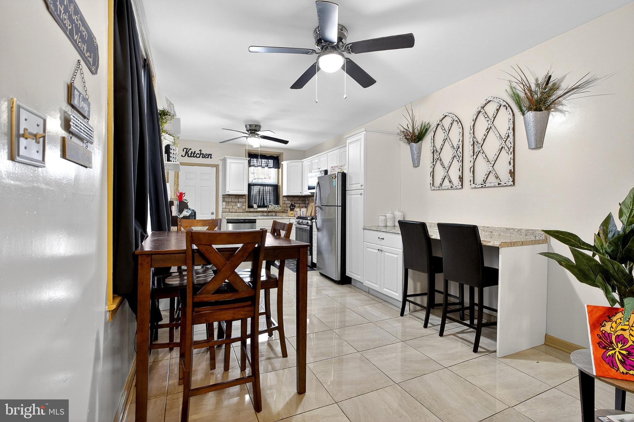 4824 Regent Street Philadelphia, PA 19143 - Photo 8 of 22 Modern kitchen with stylish decor and light.