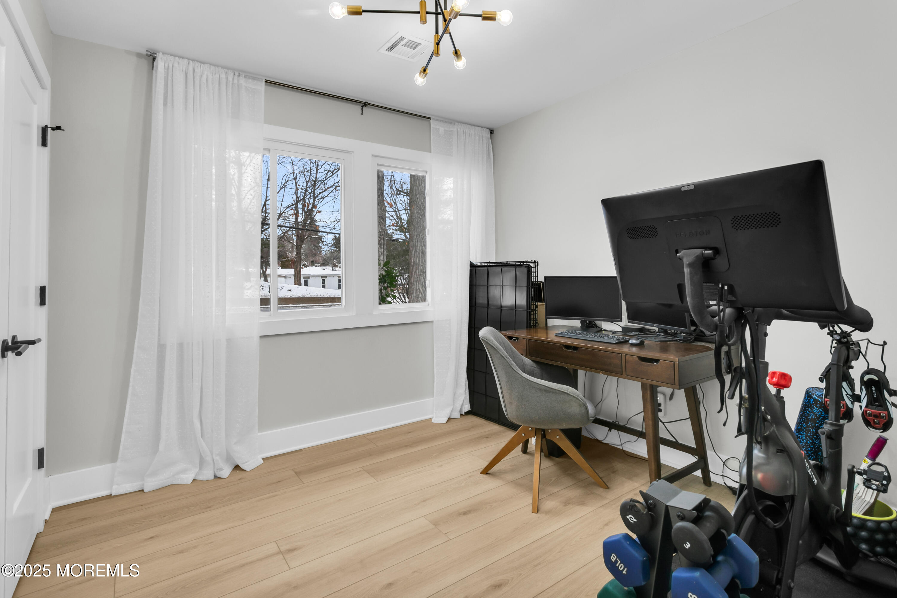 197 Oak Hill Road Red Bank, NJ 07701 - Photo 13 of 26 a workspace with furniture and a window