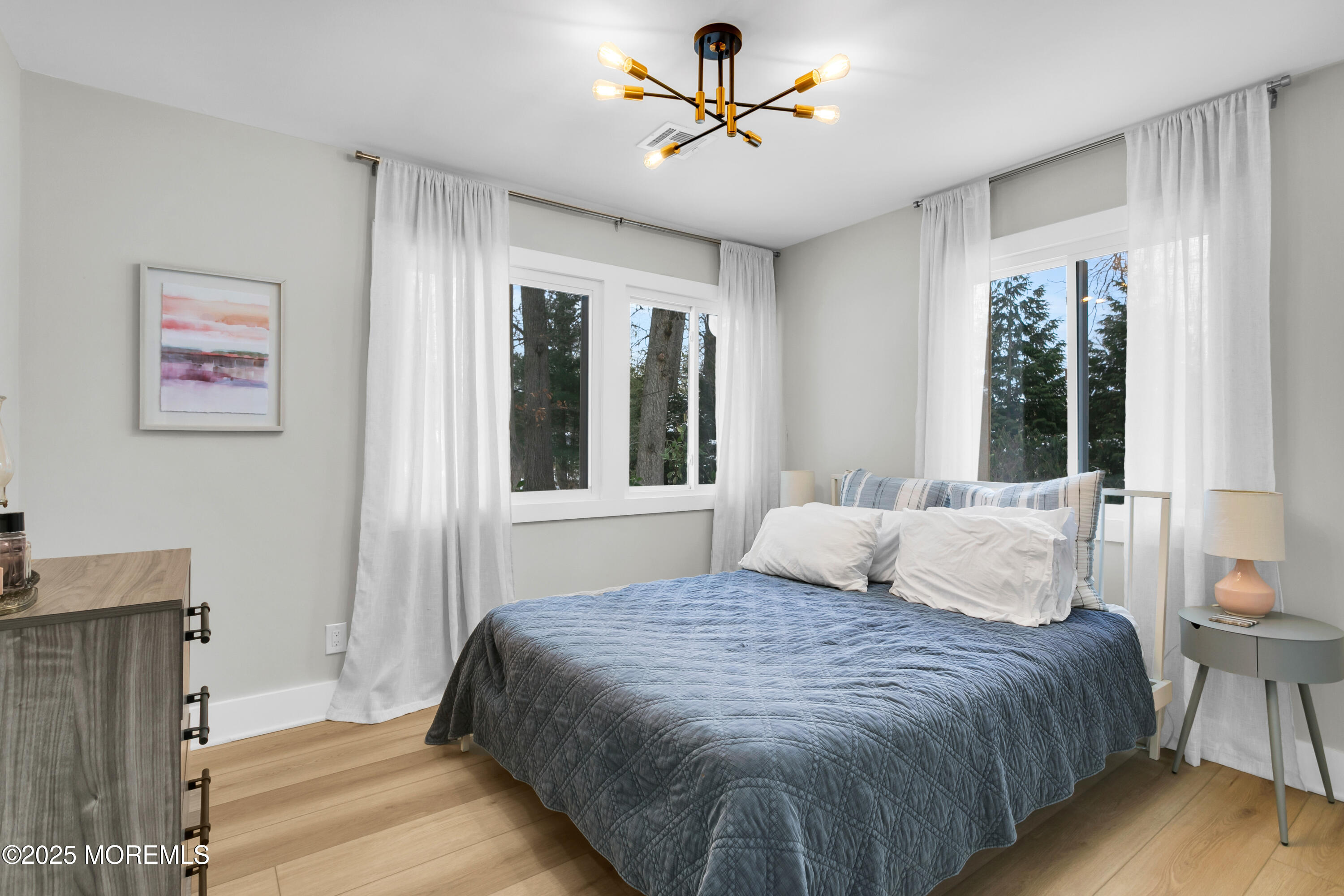 197 Oak Hill Road Red Bank, NJ 07701 - Photo 18 of 26 a bedroom with a large bed and a window