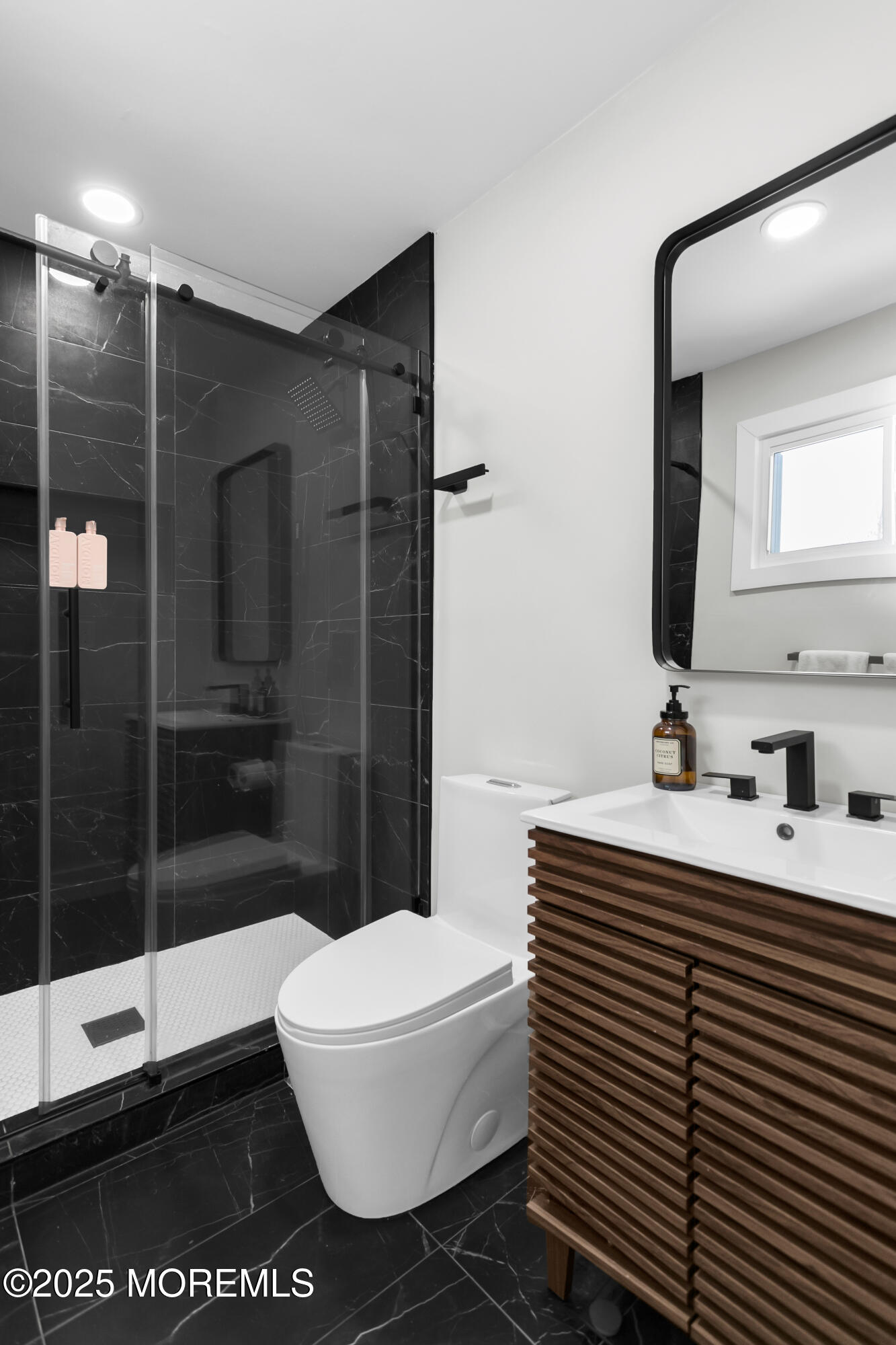 197 Oak Hill Road Red Bank, NJ 07701 - Photo 20 of 26 a bathroom with a sink toilet and shower