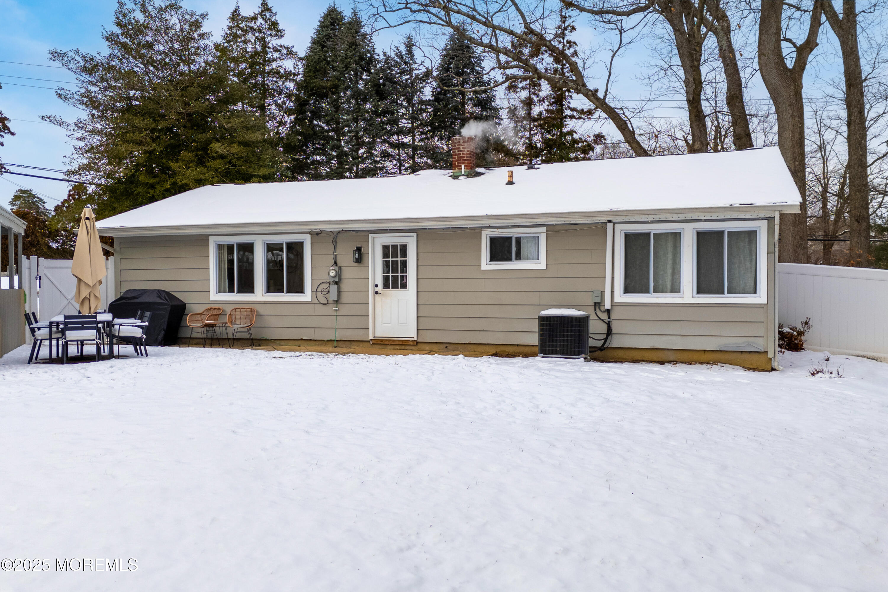 197 Oak Hill Road Red Bank, NJ 07701 - Photo 23 of 26 a front view of a house with yard and garage