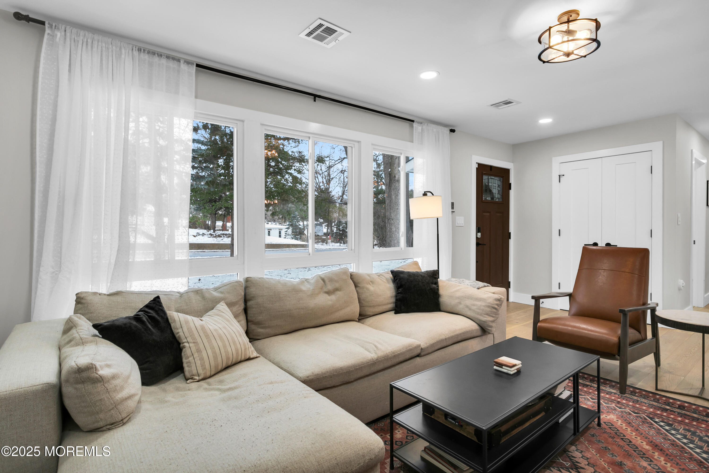 197 Oak Hill Road Red Bank, NJ 07701 - Photo 3 of 26 a living room with furniture and a window
