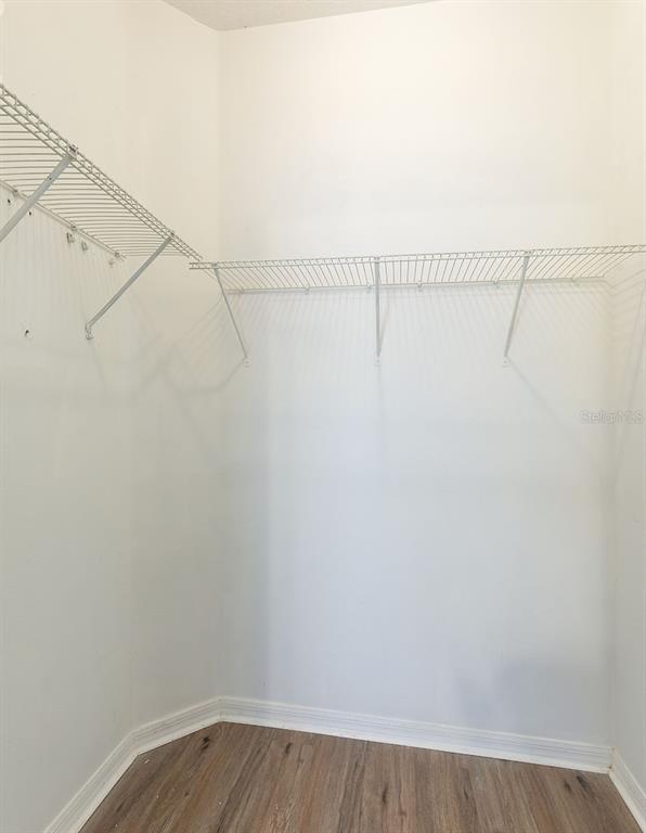 5255 Shale Ridge Trail Orlando, FL 32818 - Photo 17 of 24 a view of small space with racks on the wall