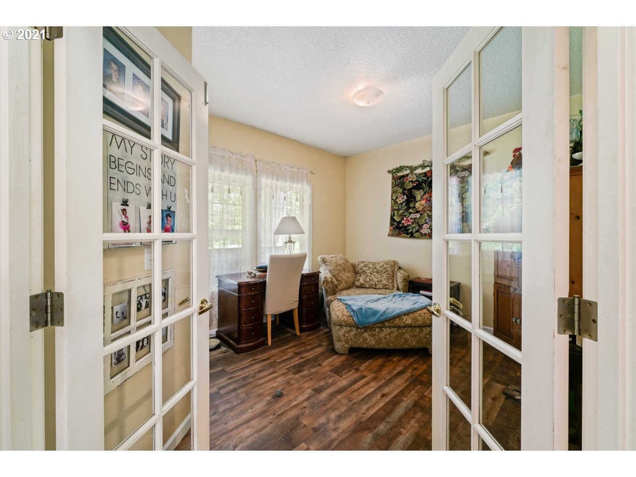 29000 Southeast Knox Road Boring, OR 97009 - Photo 21 of 30 a bedroom with furniture and a wooden floor