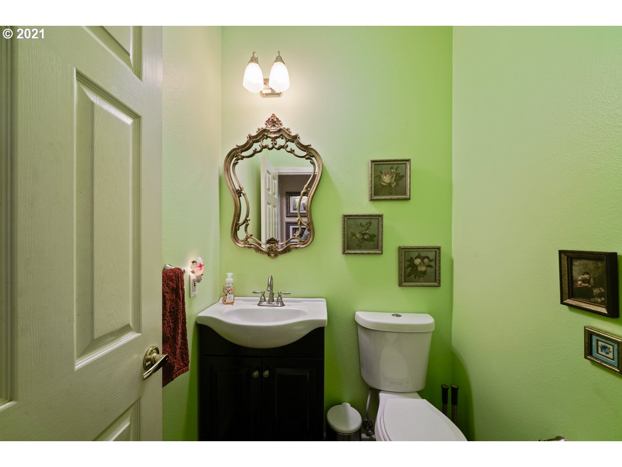 29000 Southeast Knox Road Boring, OR 97009 - Photo 22 of 30 a bathroom with a toilet sink and mirror