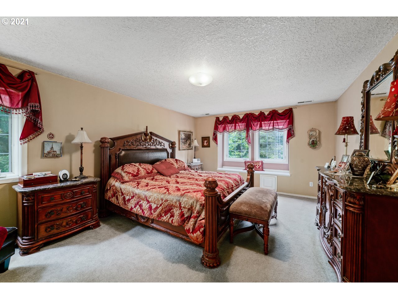 29000 Southeast Knox Road Boring, OR 97009 - Photo 24 of 30 a bedroom with furniture and a flat screen tv