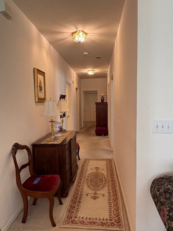 1 Riverview Boulevard, Unit 38 Methuen, MA 01844 - Photo 18 of 41 a view of a hallway with workspace