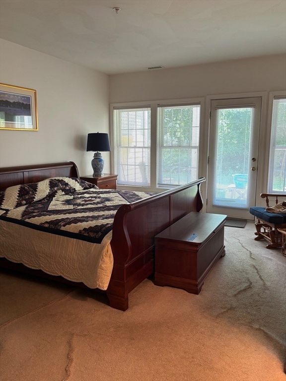 1 Riverview Boulevard, Unit 38 Methuen, MA 01844 - Photo 20 of 41 a living room with furniture rug and a large window