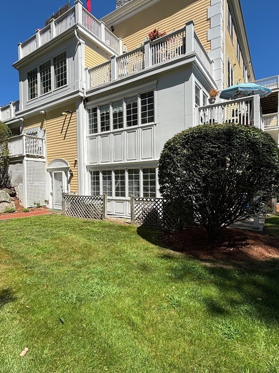 1 Riverview Boulevard, Unit 38 Methuen, MA 01844 - Photo 2 of 41 a front view of a house with a garden