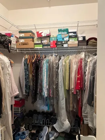 a view of a livingroom with furniture and windows