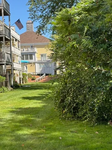 a view of a house with a street