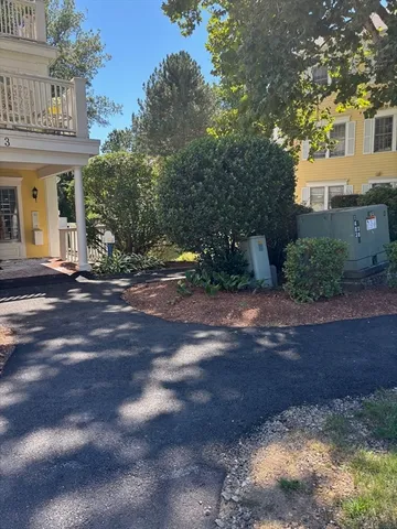 a view of house with a street