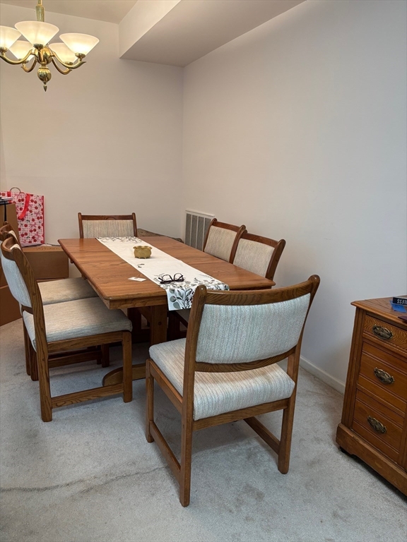 1 Riverview Boulevard, Unit 38 Methuen, MA 01844 - Photo 10 of 41 a bedroom with a bed and a dresser