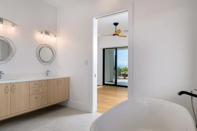 a view of a hallway with windows